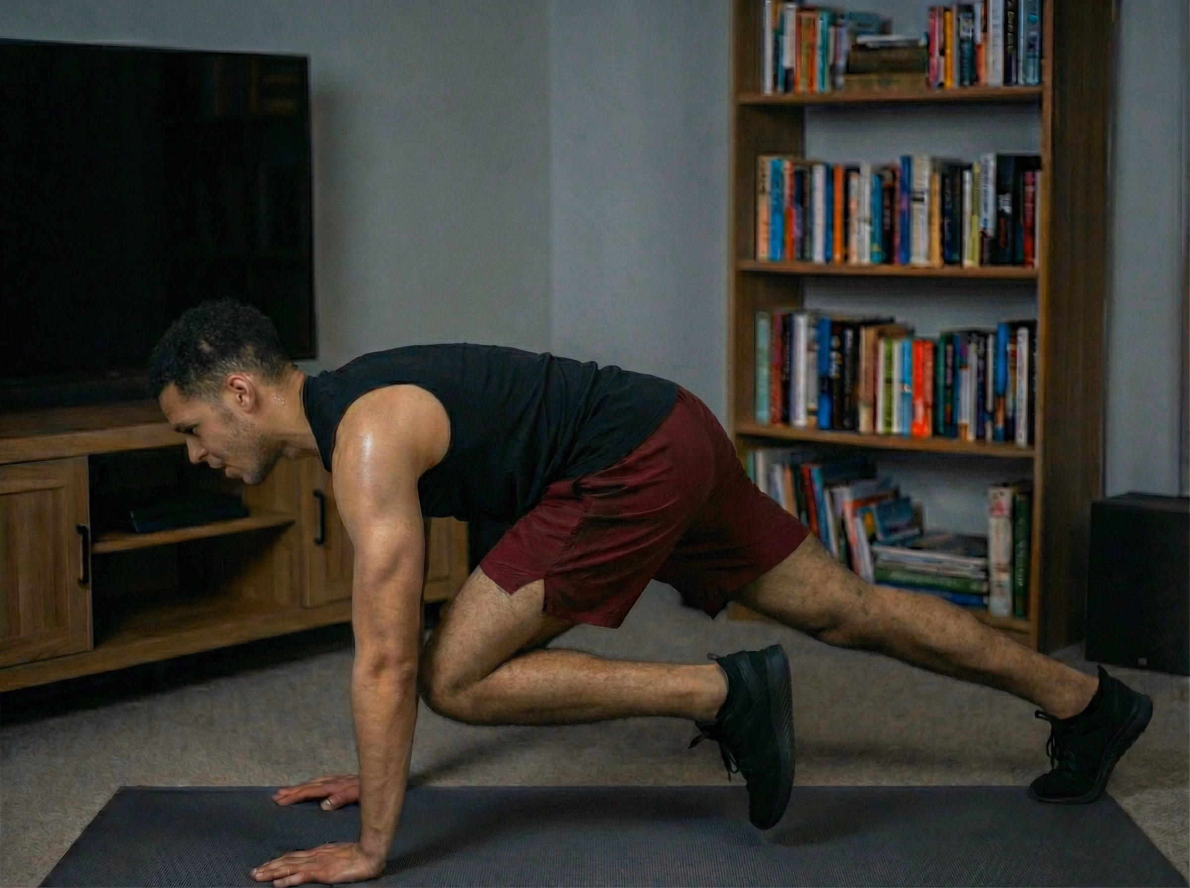 Side view of teen in fast mountain climbers with blue glow along the front of the body