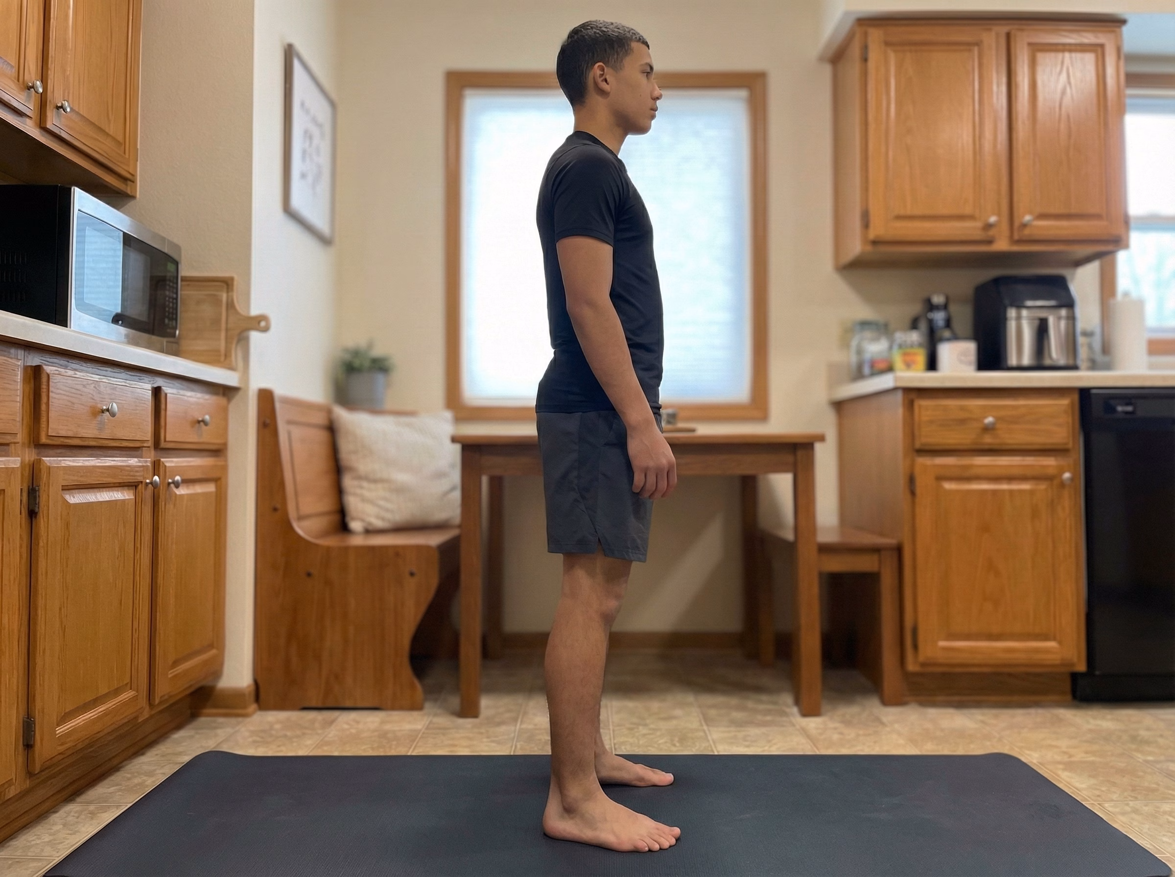 Standing posture after deep squat hold with neutral pelvis and tall spine