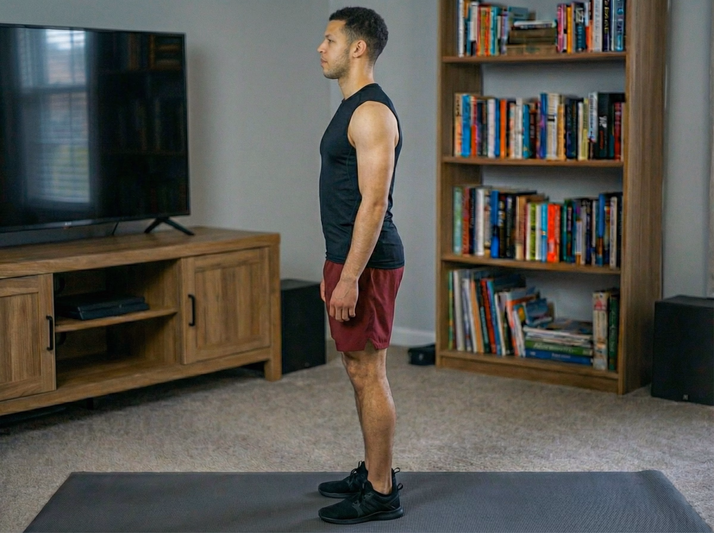 Teen standing taller with a longer torso after repeated mountain climber training