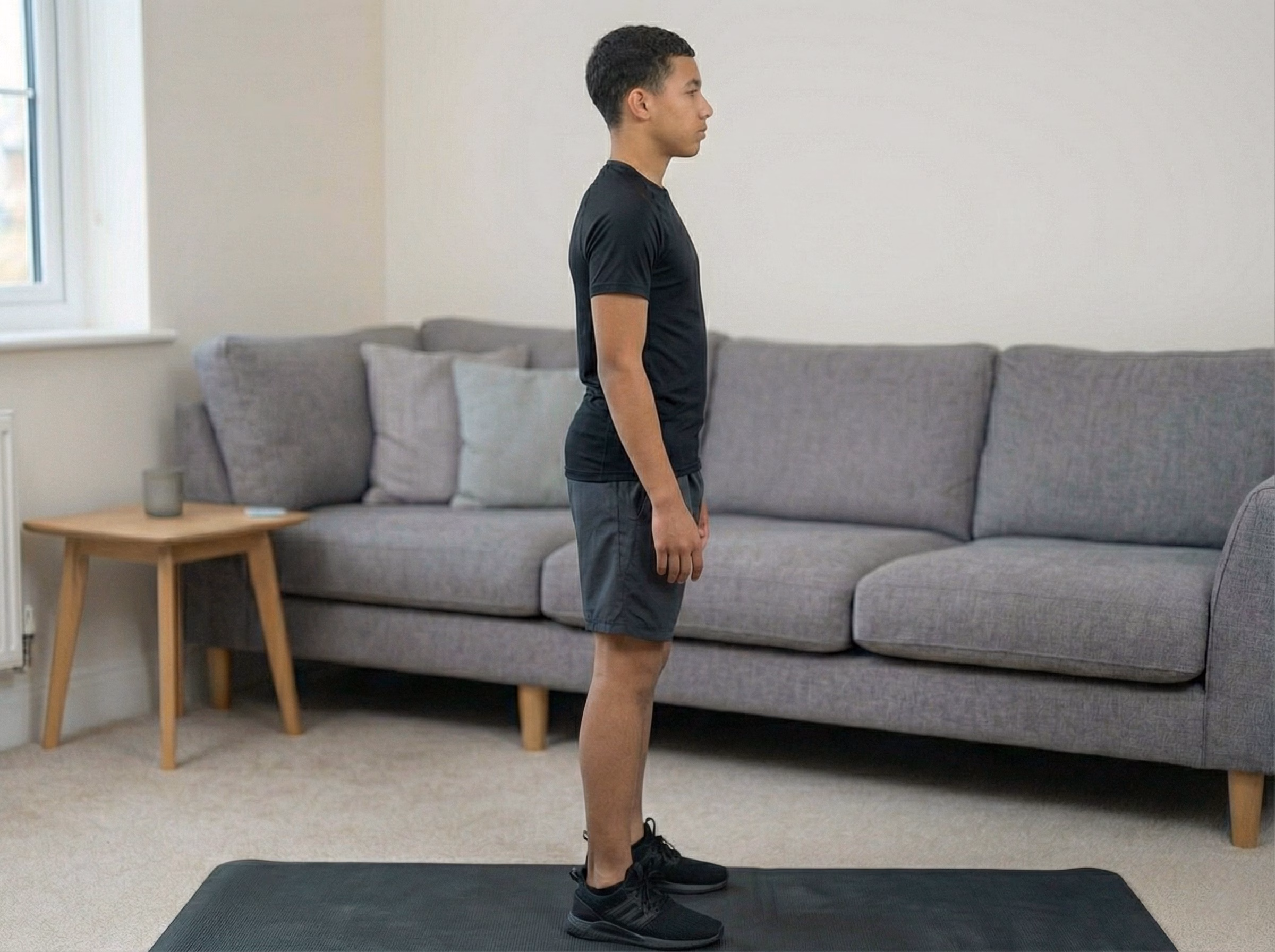 Teen standing taller and more stable after squat training