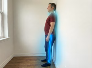 Wall Chin Tuck: Align Cervical Spine – Postural Collapse