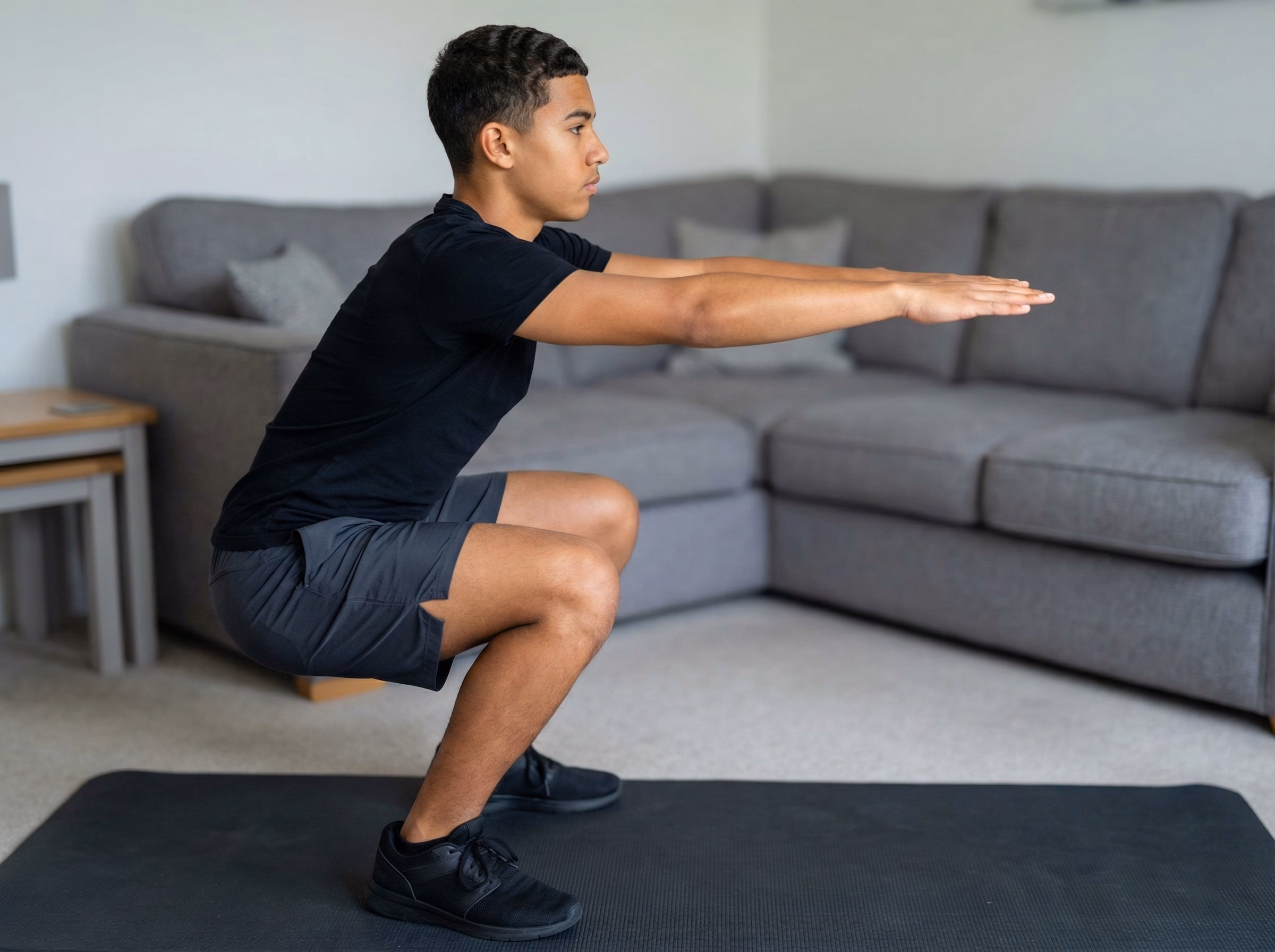 Step 2 – Teen in mid-squat with a blue alignment line
