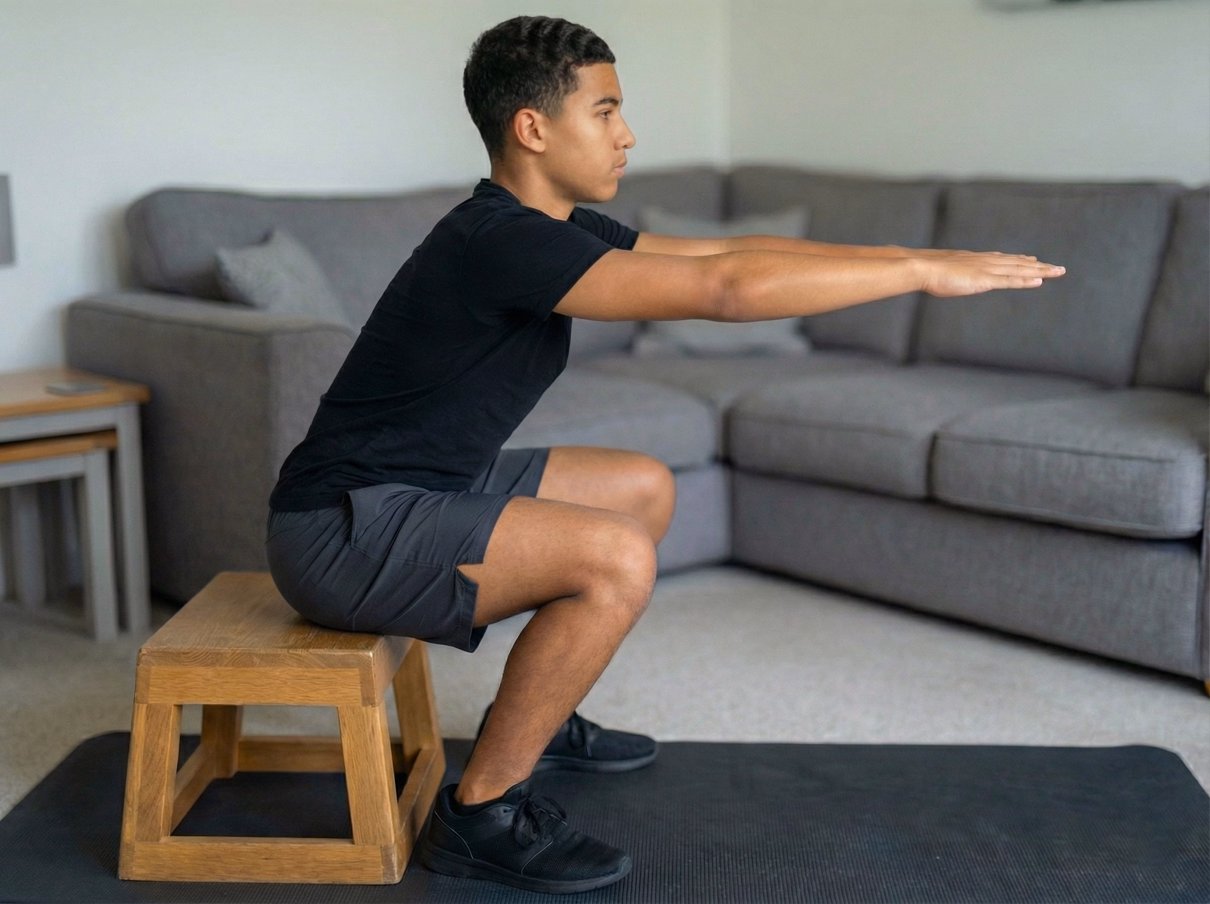 Box squat variation to learn depth and control