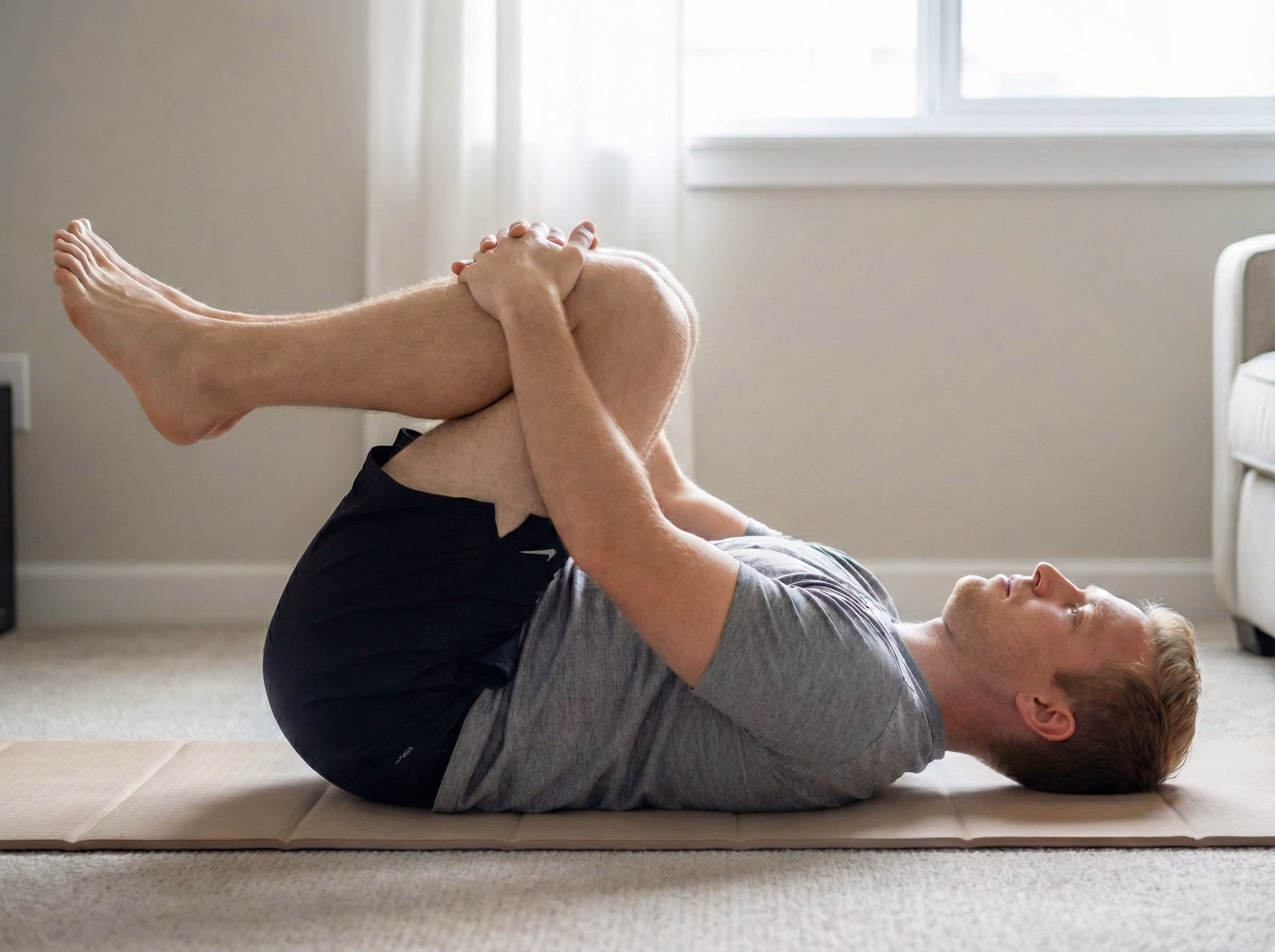 Knees-to-chest rock variation one