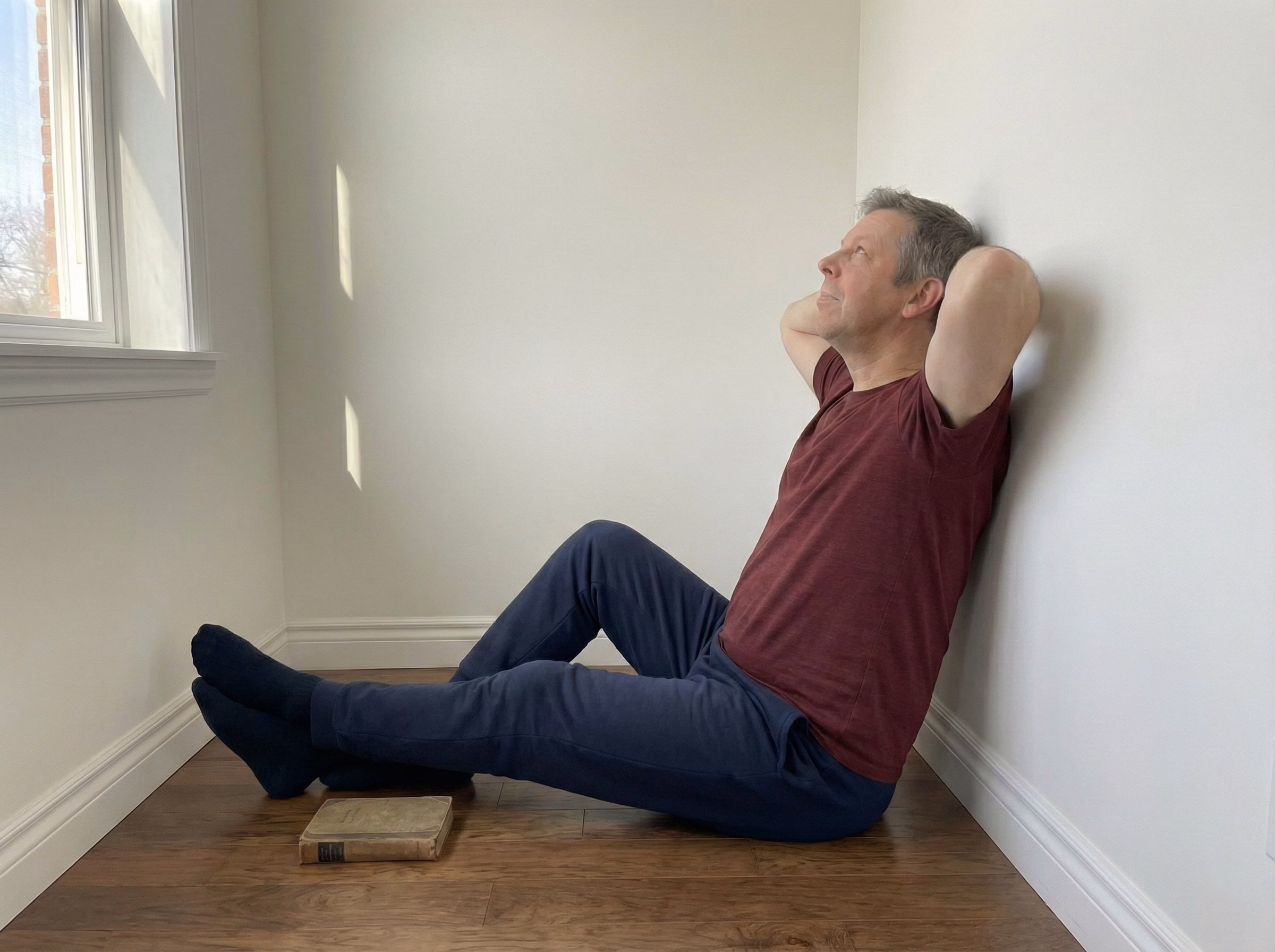 Wall chin tuck exercise variation two