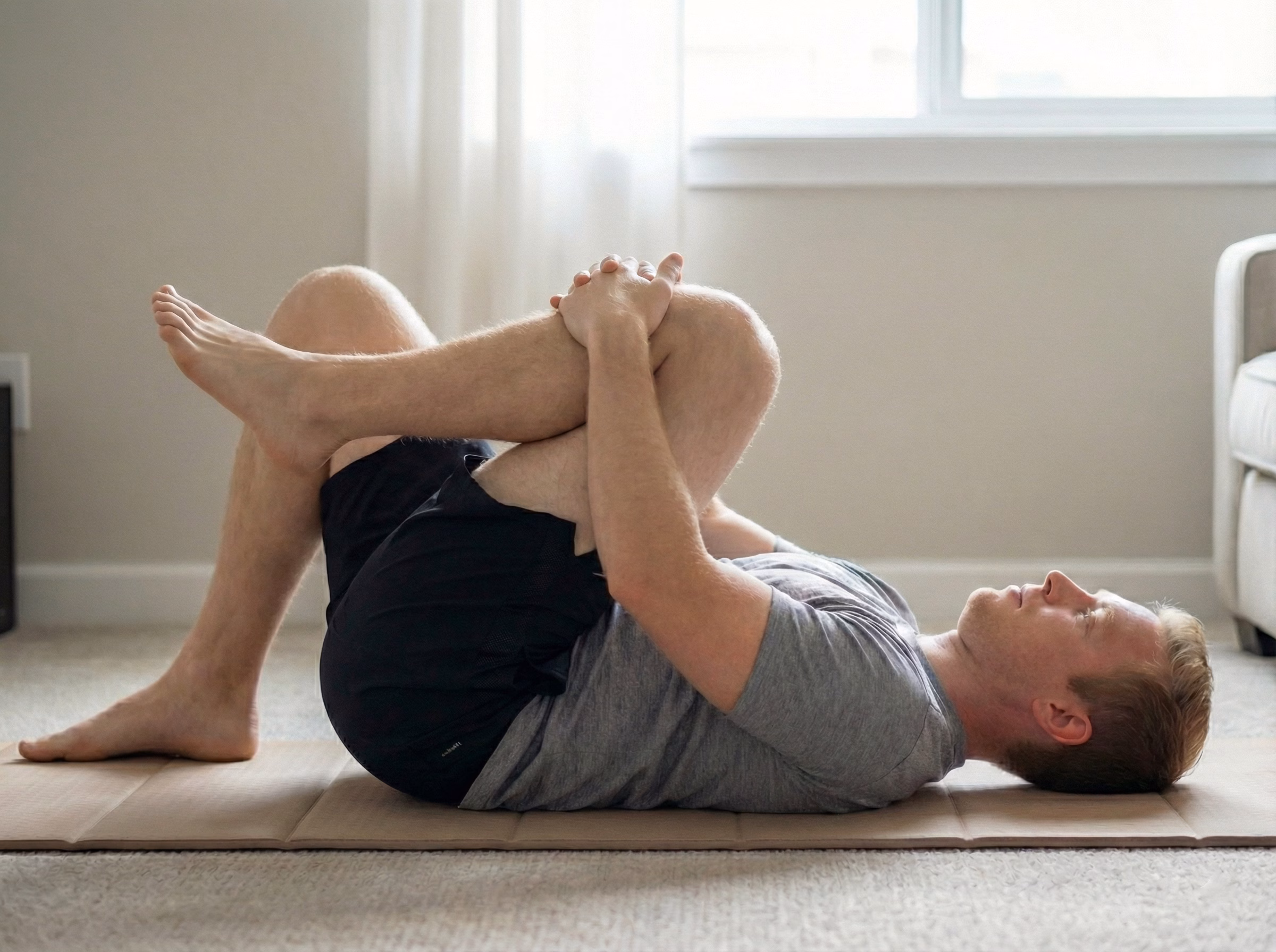 Knees-to-chest rock variation two