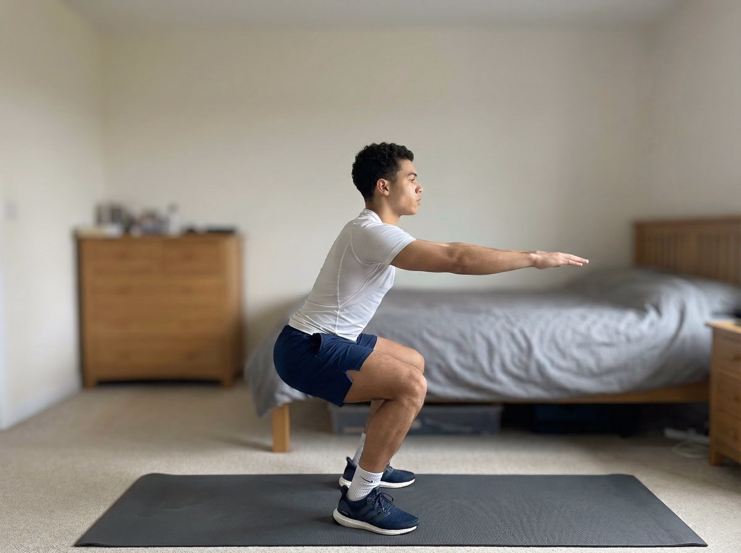 Step 1 – Teen in a strong squat position before jumping
