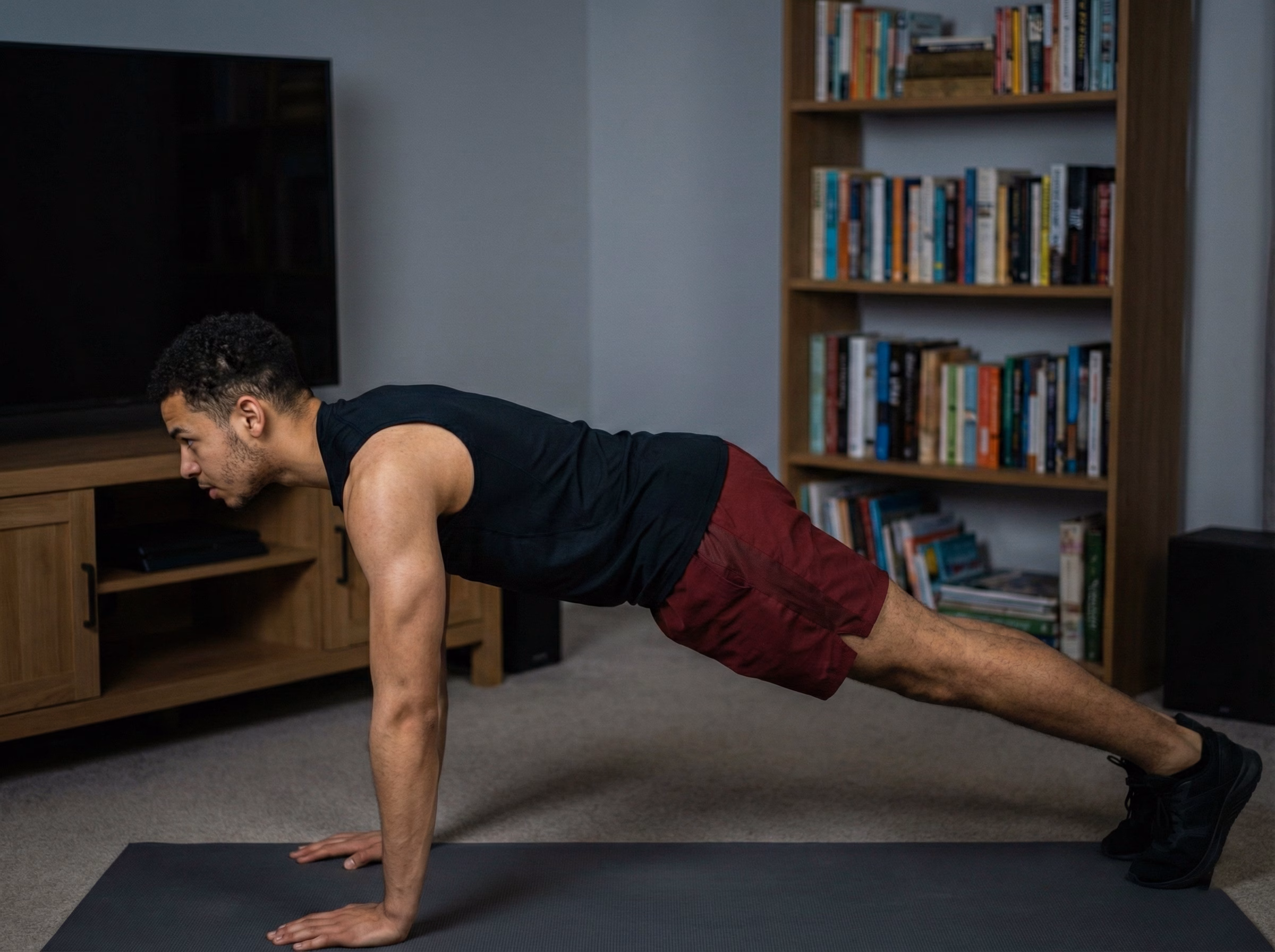 Step 1 – Teen holding a strong plank before starting mountain climbers