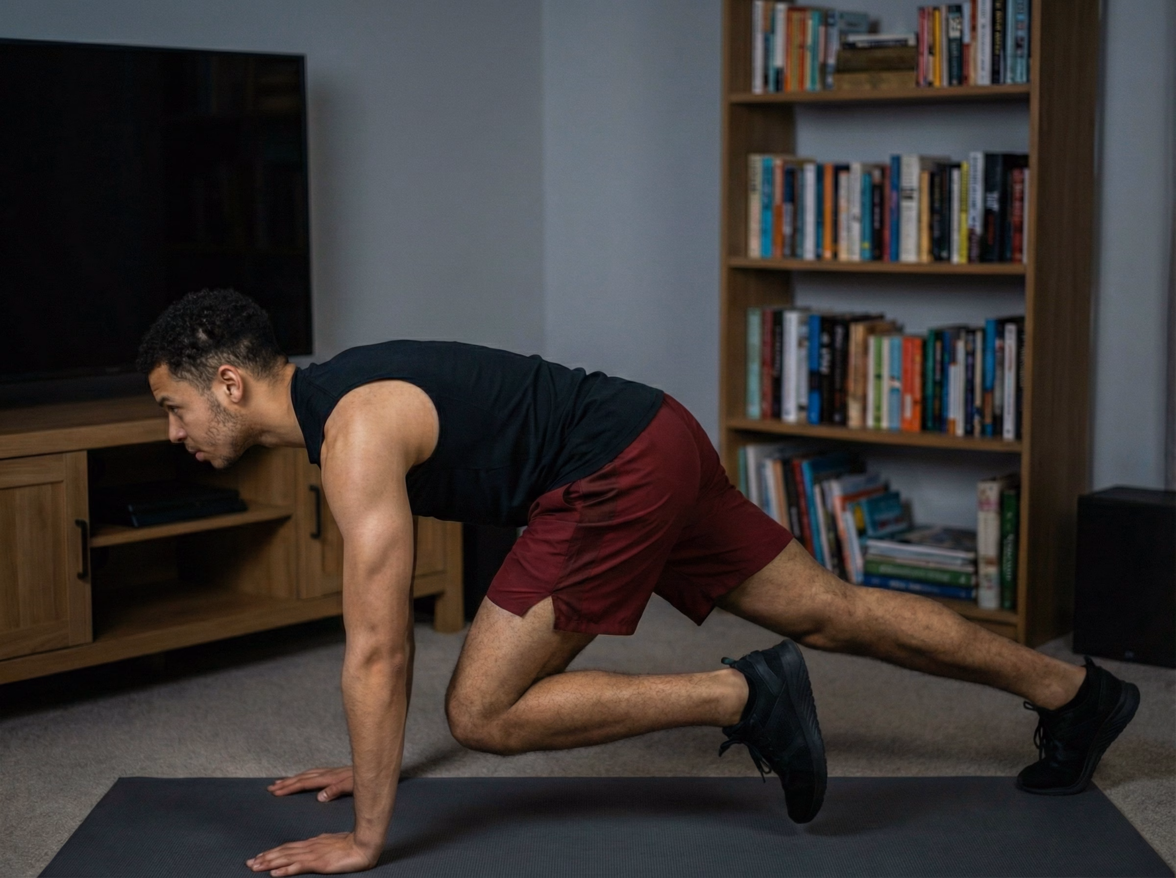 Step 2 – Teen doing a slow, controlled mountain climber knee drive