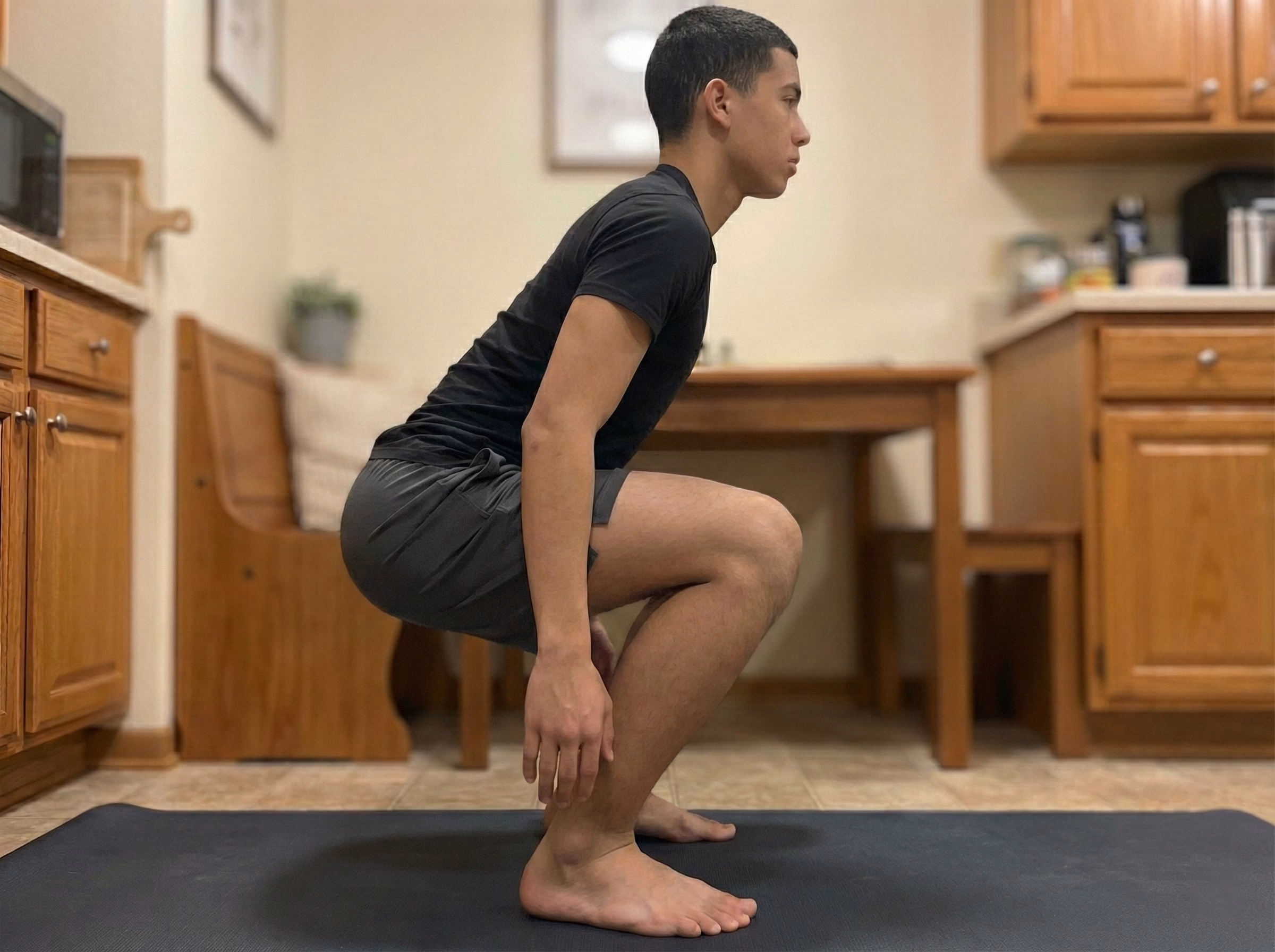 Step 3 – Standing tall after deep squat hold with neutral pelvis