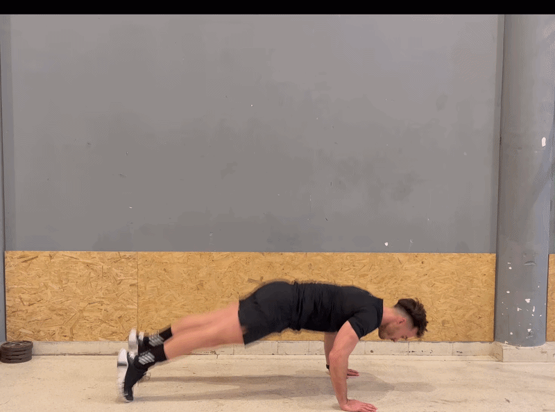 Hero – Teen athlete exploding up from a burpee with a soft blue line tracing from feet through body to fingertips