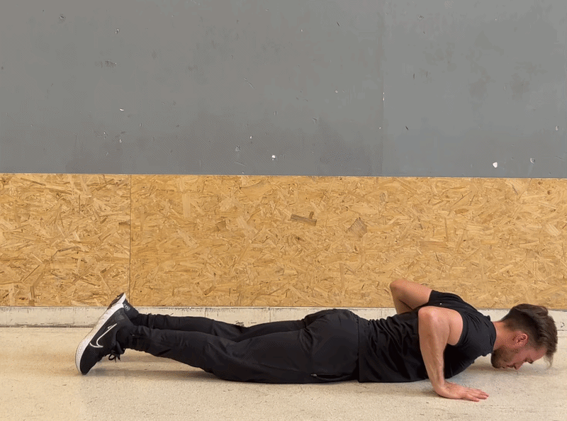 Hero image – Man #16 in Cobra Stretch with blue glow on front body