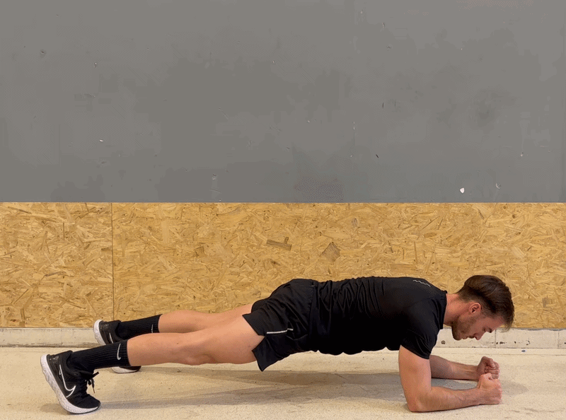 Hero image – perfect plank with straight body line and blue height glow