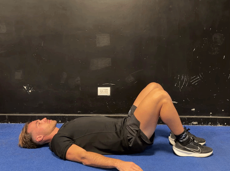 Person demonstrating the posterior pelvic tilt