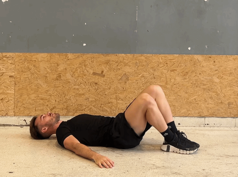 Person demonstrating the spinal twist stretch